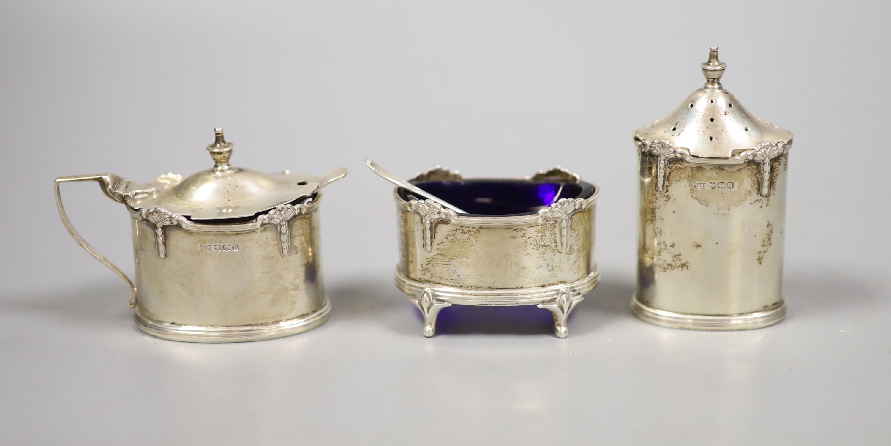 A George V silver three piece condiment set, by Mappin and Webb